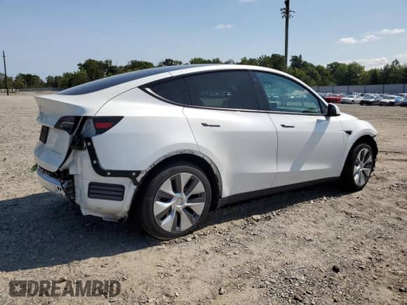 2023 Tesla Model Y Long Range с VIN 7SAYGDEE4PF596884, выставлен на аукционе Copart как лот 69856524 с пробегом 22 765 миль миль и Списание • Salvage title. История ставок и продаж доступна на DreamBid. Изображение 3.