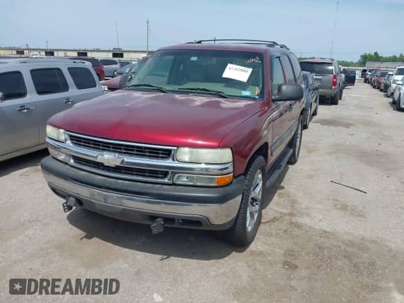 2003 Chevrolet Tahoe LT z VIN 1GNEC13Z33R302919, wystawiony jako IAAI lot #42262880 z przebiegiem 241 383 mil mil oraz . Historia ofert i sprzedaży dostępna na DreamBid. Obrazek 2.