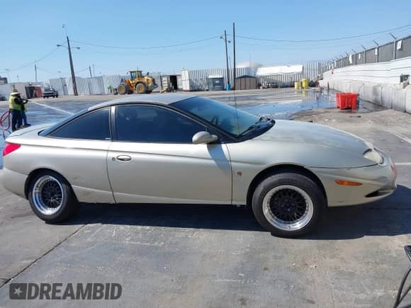 2001 Saturn SC with VIN 1G8ZY12781Z115727, listed as a IAAI auction lot 42945026 with 114,116 mi miles and . Bid and sale history available at DreamBid. Image 14.