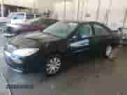 2005 Toyota Camry LE с VIN 4T1BE32K65U029749, выставлен на аукционе Copart как лот 81215475 с пробегом 217 053 миль миль и Списание • Salvage title. История ставок и продаж доступна на DreamBid. Изображение 1.