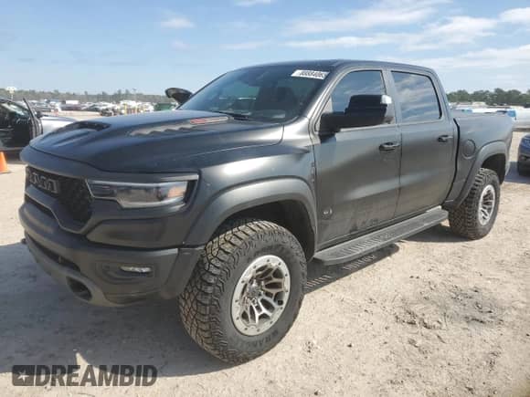 2023 Ram 1500 TRX z VIN 1C6SRFU96PN515714, wystawiony jako Copart lot #88884065 z przebiegiem 15 395 mil mil oraz Szkoda całkowita • Salvage title. Historia ofert i sprzedaży dostępna na DreamBid. Obrazek 1.