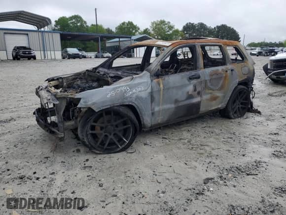 2012 Jeep Grand Cherokee SRT-8 с VIN 1C4RJFDJ0CC113413, выставлен на аукционе Copart как лот 51763425 с пробегом Не указан миль и На запчасти • Non repairable. История ставок и продаж доступна на DreamBid. Изображение 1.