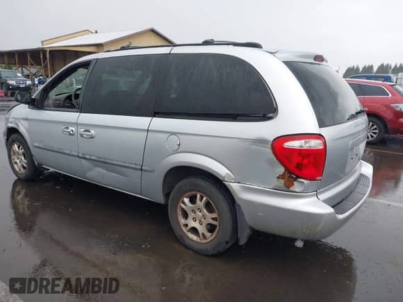 2001 Dodge Caravan EX with VIN 2B8GP74L61R352672, listed as a IAAI auction lot 42537881 with 199,767 mi miles and . Bid and sale history available at DreamBid. Image 3.