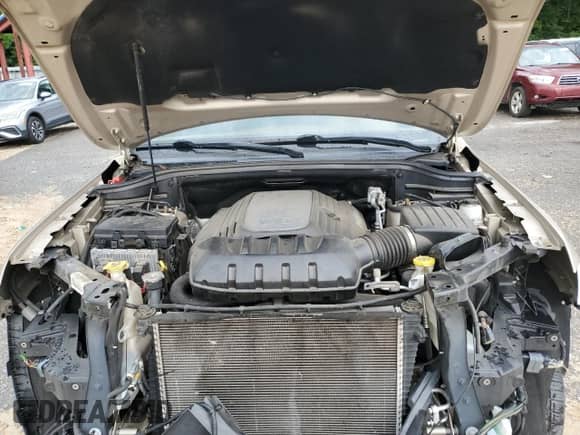 2015 Jeep Grand Cherokee Summit с VIN 1C4RJFJT8FC167844, выставлен на аукционе Copart как лот 67189905 с пробегом 81 269 миль миль и Списание • Salvage title. История ставок и продаж доступна на DreamBid. Изображение 12.