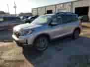 2023 Honda Passport EX-L with VIN 5FNYF8H55PB008414, listed as a Copart auction lot 67765585 with 18,682 mi miles and Non repairable. Bid and sale history available at DreamBid. Image 1.