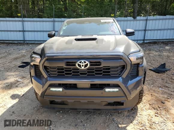 2025 Toyota Tacoma SR5 with VIN 3TMKB5FN4SM030413, listed as a Copart auction lot 69246415 with 2,871 mi miles and Salvage title. Bid and sale history available at DreamBid. Image 5.