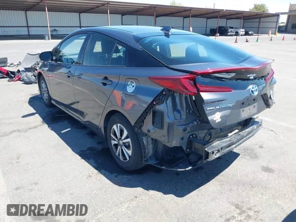 2018 Toyota Prius Plus z VIN JTDKARFP3J3073801, wystawiony jako IAAI lot #42903373 z przebiegiem 90 429 mil mil oraz . Historia ofert i sprzedaży dostępna na DreamBid. Obrazek 3.
