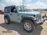 2023 Jeep Wrangler Sport with VIN 1C4HJXAG2PW650279, listed as a Copart auction lot 65038835 with 10,349 mi miles and Salvage title. Bid and sale history available at DreamBid. Image 4.
