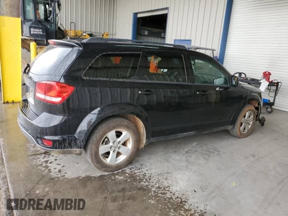 2012 Dodge Journey SXT z VIN 3C4PDCBG4CT180590, wystawiony jako Copart lot #70357815 z przebiegiem 157 871 mil mil oraz Szkoda całkowita • Salvage title. Historia ofert i sprzedaży dostępna na DreamBid. Obrazek 3.