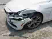 2018 BMW 4 Series 430i with VIN WBA4W3C59JAB87064, listed as a IAAI auction lot 42406199 with 154,938 mi miles and . Bid and sale history available at DreamBid. Image 6.