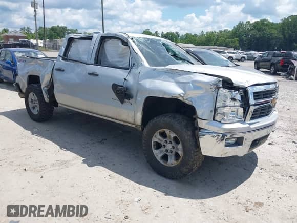 2014 Chevrolet Silverado 1500 LT z VIN 3GCUKREC9EG540582, wystawiony jako IAAI lot #42675516 z przebiegiem 157 998 mil mil oraz . Historia ofert i sprzedaży dostępna na DreamBid. Obrazek 1.