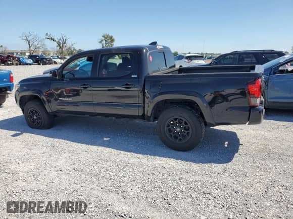 2022 Toyota Tacoma SR5 with VIN 3TMAZ5CN5NM179011, listed as a Copart auction lot 81377065 with 25,464 mi miles and Salvage title. Bid and sale history available at DreamBid. Image 2.