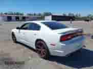 2014 Dodge Charger SE with VIN 2C3CDXBG9EH315018, listed as a IAAI auction lot 41754604 with 103,676 mi miles and . Bid and sale history available at DreamBid. Image 3.