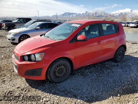 2015 Chevrolet Sonic LS with VIN 1G1JB6SH5F4101145, listed as a Copart auction lot 46629795 with 135,618 mi miles and Clean title. Bid and sale history available at DreamBid. Image 1.