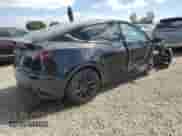 2022 Tesla Model Y Long Range with VIN 7SAYGAEE0NF340771, listed as a Copart auction lot 85189405 with 60,930 mi miles and Salvage title. Bid and sale history available at DreamBid. Image 3.