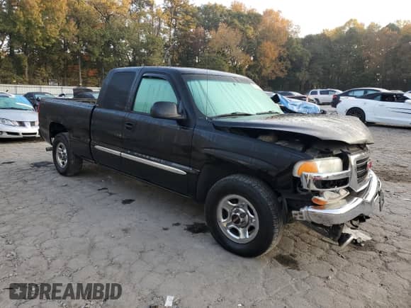 2003 GMC Sierra 1500 with VIN 2GTEC19V231224316, listed as a Copart auction lot 77910024 with 315,660 mi miles and Salvage title. Bid and sale history available at DreamBid. Image 4.