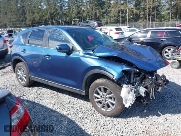 2023 Mazda CX-5 S Preferred z VIN JM3KFBCM9P0258634, wystawiony jako IAAI lot #42224168 z przebiegiem 9 519 mil mil oraz . Historia ofert i sprzedaży dostępna na DreamBid. Obrazek 14.