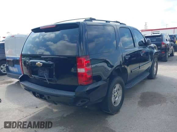 2007 Chevrolet Tahoe LS with VIN 1GNFC13CX7R423839, listed as a IAAI auction lot 42723376 with 264,345 mi miles and . Bid and sale history available at DreamBid. Image 4.