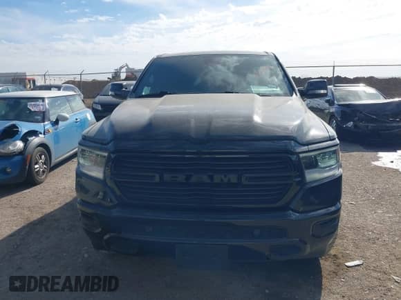 2021 Ram 1500 Lone Star z VIN 1C6RREFT9MN629588, wystawiony jako IAAI lot #41388994 z przebiegiem 85 508 mil mil oraz . Historia ofert i sprzedaży dostępna na DreamBid. Obrazek 12.