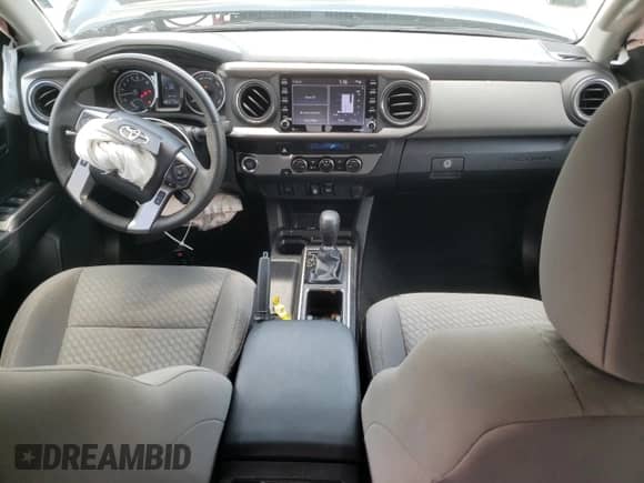 2023 Toyota Tacoma SR5 z VIN 3TMAZ5CN9PM213146, wystawiony jako Copart lot #64479895 z przebiegiem 28 057 mil mil oraz Szkoda całkowita • Salvage title. Historia ofert i sprzedaży dostępna na DreamBid. Obrazek 8.