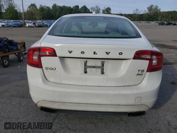 2014 Volvo S60 T5 z VIN YV1612FHXE1290131, wystawiony jako Copart lot #84538645 z przebiegiem 129 944 mil mil oraz Szkoda całkowita • Salvage title. Historia ofert i sprzedaży dostępna na DreamBid. Obrazek 6.