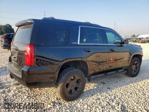 2017 Chevrolet Tahoe LT с VIN 1GNSKBKC7HR317567, выставлен на аукционе Copart как лот 69034435 с пробегом 107 846 миль миль и Списание • Salvage title. История ставок и продаж доступна на DreamBid. Изображение 3.