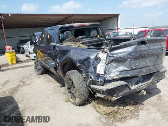 2023 Chevrolet Silverado 1500 RST with VIN 2GCUDEEDXP1151506, listed as a IAAI auction lot 42046652 with Not provided miles and . Bid and sale history available at DreamBid. Image 3.