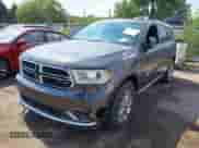 2016 Dodge Durango SXT with VIN 1C4RDJAG5GC393418, listed as a IAAI auction lot 43206789 with 153,703 mi miles and . Bid and sale history available at DreamBid. Image 2.