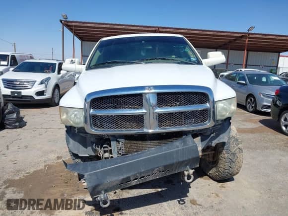 2005 Dodge 2500 SLT z VIN 3D7KS28C05G741609, wystawiony jako IAAI lot #42322081 z przebiegiem 323 407 mil mil oraz . Historia ofert i sprzedaży dostępna na DreamBid. Obrazek 12.