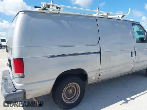 2014 Ford Econoline Cargo Commercial with VIN 1FTNE1EW4EDB05697, listed as a IAAI auction lot 42899014 with 216,329 mi miles and . Bid and sale history available at DreamBid. Image 18.