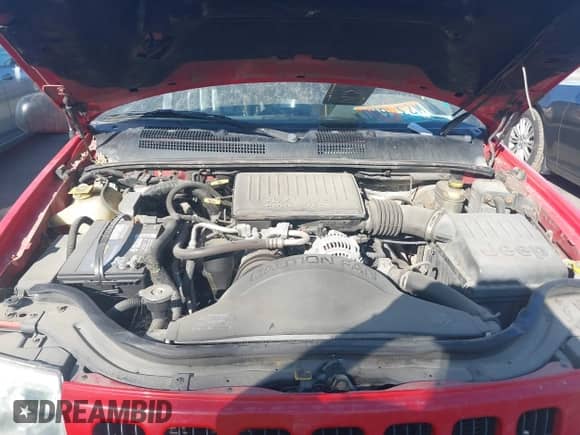 2000 Jeep Grand Cherokee Limited z VIN 1J4GW58N5YC186410, wystawiony jako IAAI lot #42504152 z przebiegiem 140 982 mil mil oraz . Historia ofert i sprzedaży dostępna na DreamBid. Obrazek 10.