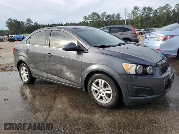 2012 Chevrolet Sonic LT z VIN 1G1JD5SB5C4218560, wystawiony jako Copart lot #75256184 z przebiegiem 182 339 mil mil oraz Szkoda całkowita • Salvage title. Historia ofert i sprzedaży dostępna na DreamBid. Obrazek 4.