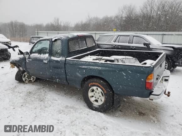 1997 Toyota Tacoma z VIN 4TAWM72N2VZ315302, wystawiony jako Copart lot #87952085 z przebiegiem 190 437 mil mil oraz Szkoda całkowita • Salvage title. Historia ofert i sprzedaży dostępna na DreamBid. Obrazek 2.