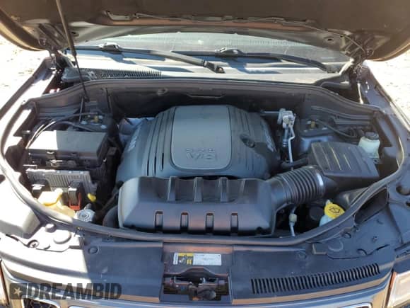 2015 Jeep Grand Cherokee Overland with VIN 1C4RJFCT8FC941023, listed as a Copart auction lot 50184215 with 185,661 mi miles and Salvage title. Bid and sale history available at DreamBid. Image 14.