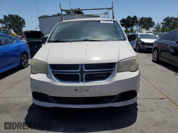 2013 Dodge Grand Caravan American Value with VIN 2C4RDGBG5DR516901, listed as a Copart auction lot 63338975 with 230,644 mi miles and Clean title. Bid and sale history available at DreamBid. Image 5.