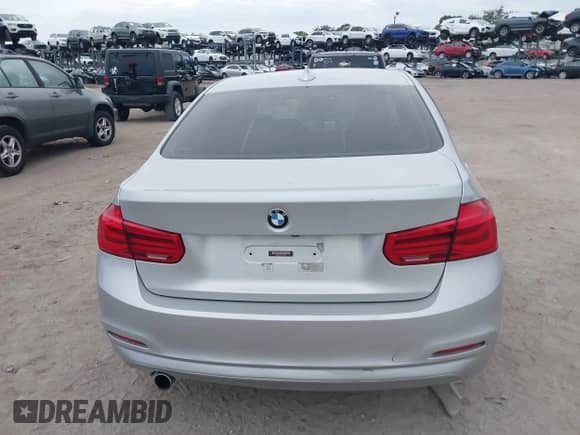 2018 BMW 3 Series 320i with VIN WBA8A9C51JAH12024, listed as a IAAI auction lot 43198146 with 98,143 mi miles and . Bid and sale history available at DreamBid. Image 16.