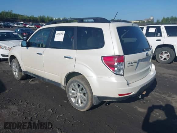 2011 Subaru Forester X Premium z VIN JF2SHADC1BG761496, wystawiony jako IAAI lot #42534776 z przebiegiem 176 885 mil mil oraz . Historia ofert i sprzedaży dostępna na DreamBid. Obrazek 3.