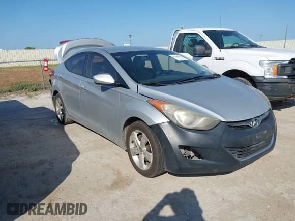 2012 Hyundai Elantra GLS z VIN KMHDH4AE6CU366081, wystawiony jako IAAI lot #42945812 z przebiegiem 145 877 mil mil oraz . Historia ofert i sprzedaży dostępna na DreamBid. Obrazek 1.