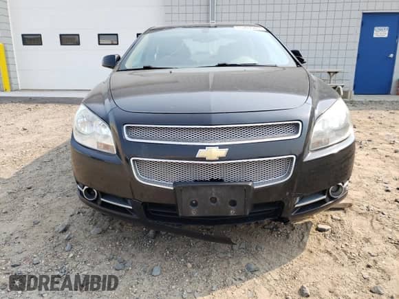 2010 Chevrolet Malibu LTZ with VIN 1G1ZE5E00AF136036, listed as a Copart auction lot 65701985 with 227,332 mi miles and Salvage title. Bid and sale history available at DreamBid. Image 5.