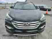 2017 Hyundai Santa Fe 2.4L z VIN 5NMZU3LB3HH008650, wystawiony jako Copart lot #86128685 z przebiegiem 150 662 mil mil oraz Czysty tytuł • Clean title. Historia ofert i sprzedaży dostępna na DreamBid. Obrazek 5.
