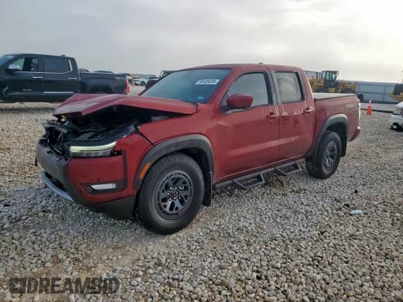 2025 Nissan Frontier Pro-X with VIN 1N6ED1EJXSN637854, listed as a Copart auction lot 65409335 with 2,410 mi miles and Salvage title. Bid and sale history available at DreamBid. Image 1.