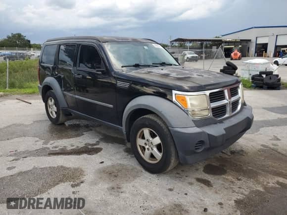 2007 Dodge Nitro SXT with VIN 1D8GT28K97W587301, listed as a Copart auction lot 64649745 with 226,287 mi miles and Salvage title. Bid and sale history available at DreamBid. Image 4.