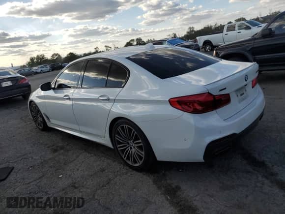 2018 BMW 5 Series M550i xDrive with VIN WBAJB9C52JB285992, listed as a Copart auction lot 81937825 with Not provided miles and Salvage title. Bid and sale history available at DreamBid. Image 2.