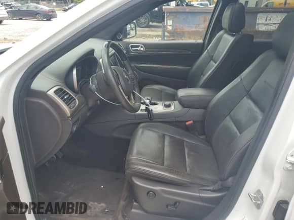 2014 Jeep Grand Cherokee Summit with VIN 1C4RJFJM8EC512541, listed as a Copart auction lot 66323515 with 165,081 mi miles and Clean title. Bid and sale history available at DreamBid. Image 7.