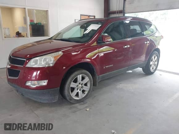 2009 Chevrolet Traverse 1LT with VIN 1GNER23D79S155918, listed as a IAAI auction lot 42590328 with 185,627 mi miles and . Bid and sale history available at DreamBid. Image 2.