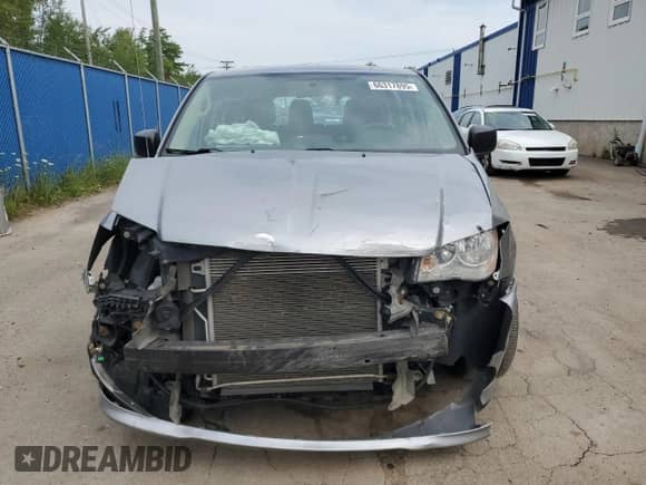 2015 Dodge Grand Caravan American Value with VIN 2C4RDGBG6FR565950, listed as a Copart auction lot 66317895 with 136,573 mi miles and Salvage title. Bid and sale history available at DreamBid. Image 5.