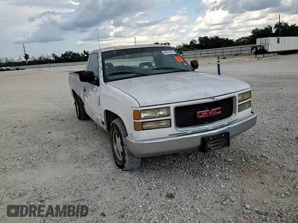 1994 GMC Sierra 1500 z VIN 1GTDC14Z1RZ501012, wystawiony jako Copart lot #68832095 z przebiegiem 94 450 mil mil oraz Szkoda całkowita • Salvage title. Historia ofert i sprzedaży dostępna na DreamBid. Obrazek 13.