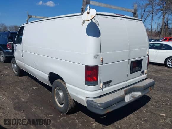 2003 Ford Econoline Cargo with VIN 1FTNE24LX3HA42513, listed as a IAAI auction lot 41858493 with 316,475 mi miles and . Bid and sale history available at DreamBid. Image 3.