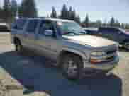 2001 Chevrolet Suburban LT z VIN 3GNFK16T11G189080, wystawiony jako Copart lot #69285174 z przebiegiem 276 069 mil mil oraz Czysty tytuł • Clean title. Historia ofert i sprzedaży dostępna na DreamBid. Obrazek 4.