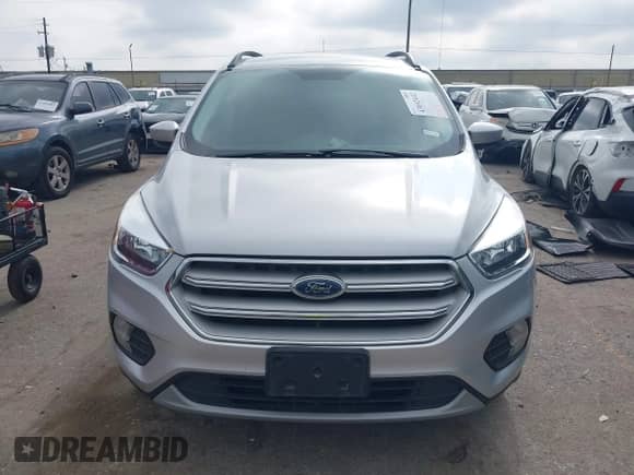 2018 Ford Escape SE z VIN 1FMCU9GD9JUC78285, wystawiony jako IAAI lot #43092402 z przebiegiem 111 326 mil mil oraz . Historia ofert i sprzedaży dostępna na DreamBid. Obrazek 12.